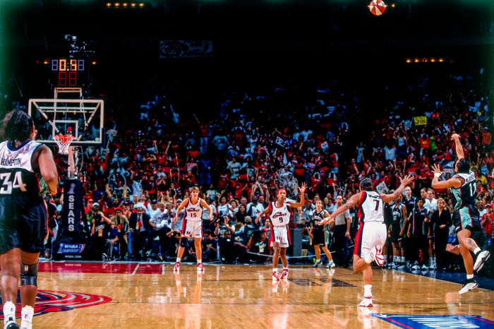 Teresa Weatherspoon heaves a three-quarter court shot